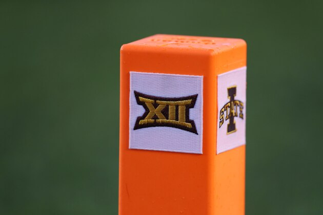 A Big 12 logo is seen on an end zone marker during the first half of an NCAA college football game between Iowa State and Iowa, Saturday, Sept. 14, 2019, in Ames, Iowa. (AP Photo/Charlie Neibergall) A Big 12 logo is seen on an end zone marker during the first half of an NCAA college football game between Iowa State and Iowa, Saturday, Sept. 14, 2019, in Ames, Iowa. (AP Photo/Charlie Neibergall)