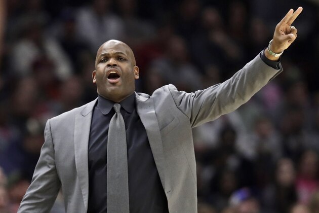 Indiana Pacers head coach Nate McMillan gives instructions to players in the second half of an NBA basketball game against the Cleveland Cavaliers, Saturday, Feb. 29, 2020, in Cleveland. Indiana won 113-104. (AP Photo/Tony Dejak)