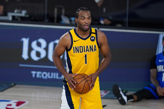 Indiana Pacers forward T.J. Warren (1) plays against the Orlando Magic during the first half of an NBA basketball game Tuesday, Aug. 4, 2020 in Lake Buena Vista, Fla. (AP Photo/Ashley Landis)