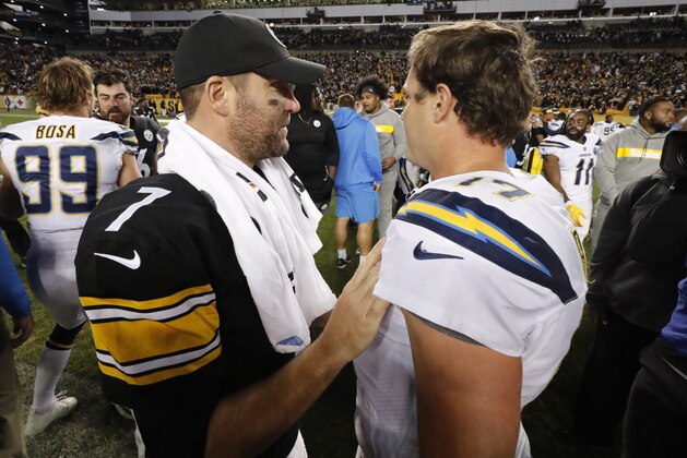 Pittsburgh Steelers quarterback Ben Roethlisberger (7) meets Los Angeles Chargers quarterback Philip Rivers (17) on the field following a 33-20 Chargers win in an NFL football game in Pittsburgh, Sunday, Dec. 2, 2018. (AP Photo/Gene J. Puskar)