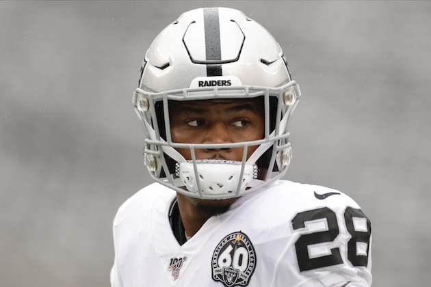 Oakland Raiders' Josh Jacobs (28) warms up before an NFL football game against the New York Jets Sunday, Nov. 24, 2019, in East Rutherford, N.J. (AP Photo/Adam Hunger)