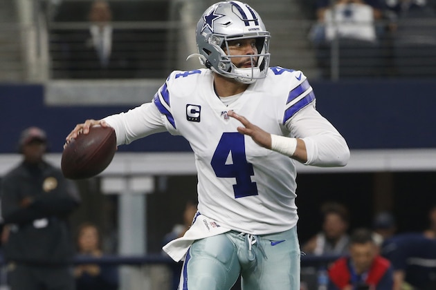 Dallas Cowboys quarterback Dak Prescott (4) looks koto throw against the Washington Redskins during the first half of an NFL football game in Arlington, Texas, Sunday, Dec. 15, 2019. (AP Photo/Ron Jenkins)