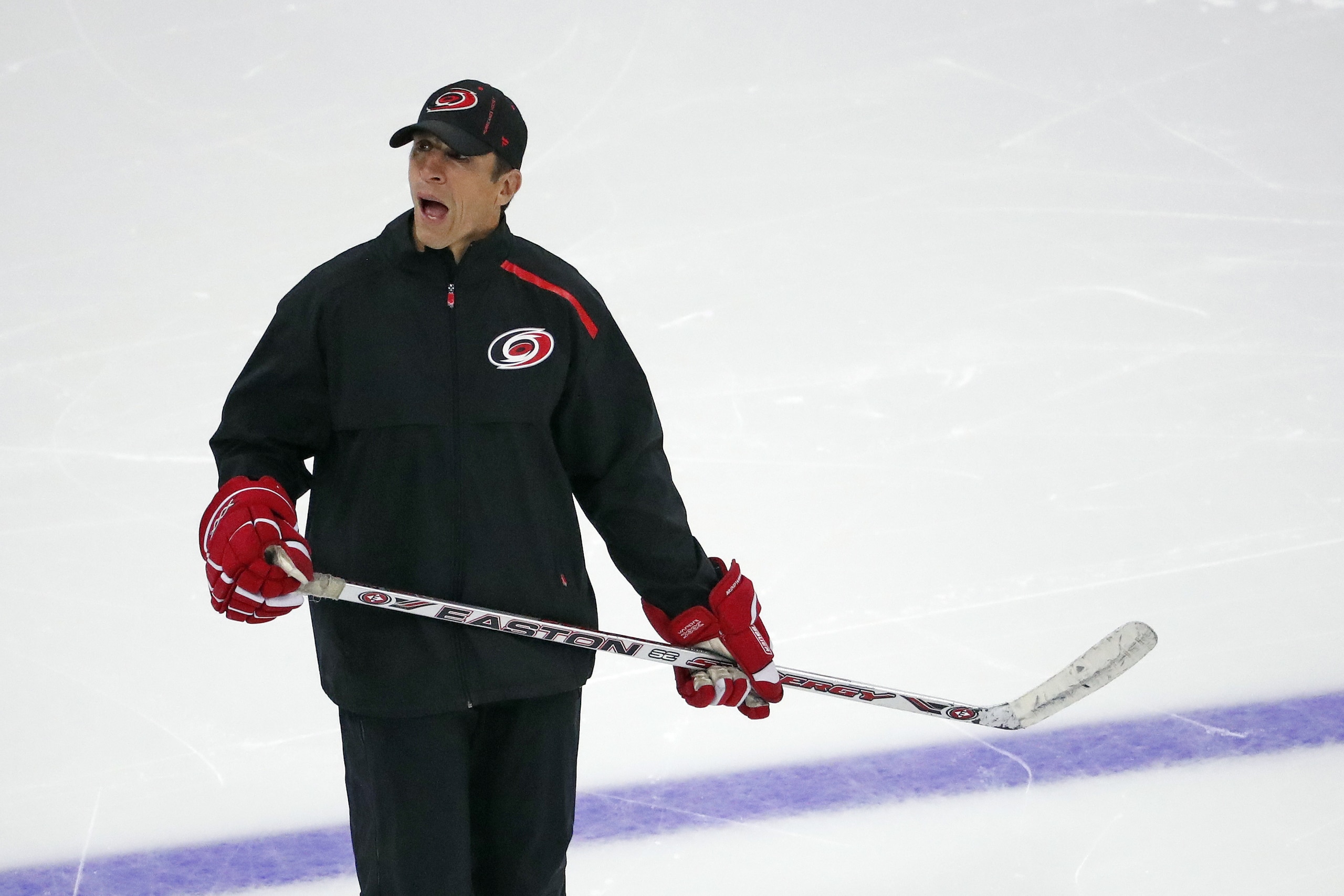 Carolina Hurricanes coach Rod Brind'Amour directs his team during an NHL hockey training session in Raleigh, N.C., Wednesday, July 15, 2020. (AP Photo/Gerry Broome)