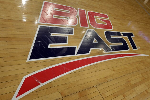 A Big East logo is displayed on the court at Madison Square Garden before an NCAA college basketball game between Marquette and St. John's, Saturday, March 9, 2013, in New York. The conference has reached an agreement with seven departing basketball members that will allow them to separate from the football schools and create their own conference on July 1. Commissioner Mike Aresco told The Associated Press on Friday the seven Catholic schools that are leaving to form a basketball-centric conference will get the Big East name, along with the opportunity to play their league tournament in Madison Square Garden.(AP Photo/Richard Drew)