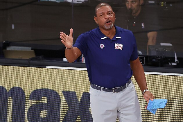 Los Angeles Clippers' head Coach Doc Rivers directs his team during the first half of an NBA basketball game against the Phoenix Suns' Tuesday, Aug. 4, 2020, in Lake Buena Vista, Fla. (Kevin C. Cox/Pool Photo via AP)