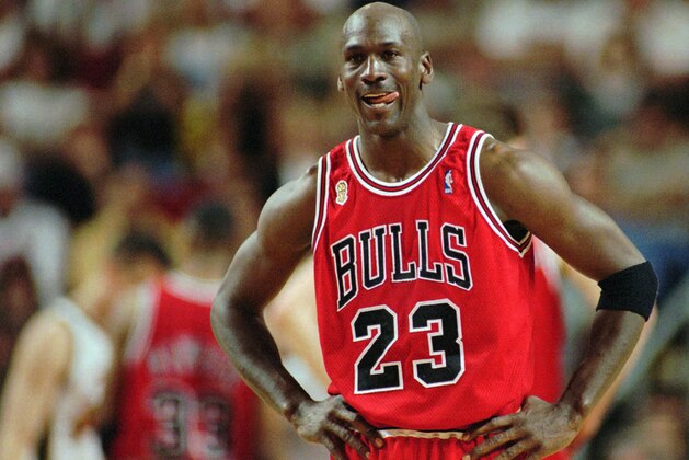 FILE - In this June 9, 1996 file photo Chicago Bulls Michael Jordan stands during a break at the end of an NBA Basketball game against the Seattle SuperSonics in Seattle. A Bismarck, N.D., man who used to own McDonald's restaurants is about $10,000 richer after selling a 20-year-old container of McJordan barbecue sauce Monday, Oct. 15, 2012, to a buyer in Chicago. The sauce was used on McJordan Burgers, named for basketball icon in limited markets for a short time in the 1990s, when Jordan led the Chicago Bulls to six NBA championships. (AP Photo/Beth A. Keiser, File) FILE - In this June 9, 1996 file photo Chicago Bulls Michael Jordan stands during a break at the end of an NBA Basketball game against the Seattle SuperSonics in Seattle. A Bismarck, N.D., man who used to own McDonald's restaurants is about $10,000 richer after selling a 20-year-old container of McJordan barbecue sauce Monday, Oct. 15, 2012, to a buyer in Chicago. The sauce was used on McJordan Burgers, named for basketball icon in limited markets for a short time in the 1990s, when Jordan led the Chicago Bulls to six NBA championships. (AP Photo/Beth A. Keiser, File)