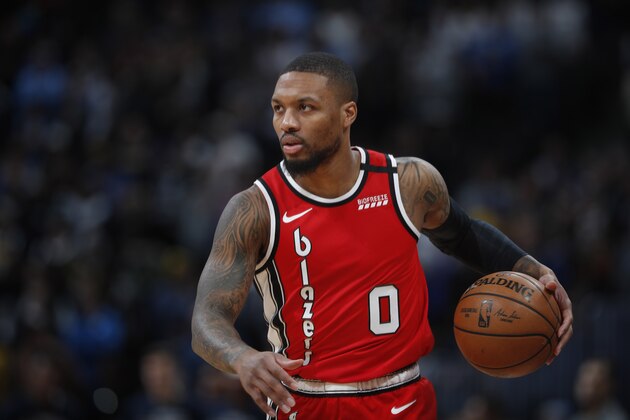 Portland Trail Blazers guard Damian Lillard (0) in the first half of an NBA basketball game Tuesday, Feb. 4, 2020, in Denver. (AP Photo/David Zalubowski)