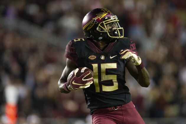 Florida State Tamorrion Terry looks over his shoulder after catching a 74 yard game winning touchdown in the second half of an NCAA college football game against Boston College in Tallahassee, Fla., Saturday, Nov. 17, 2018. Florida State defeated Boston College 22-21. (AP Photo/Mark Wallheiser)