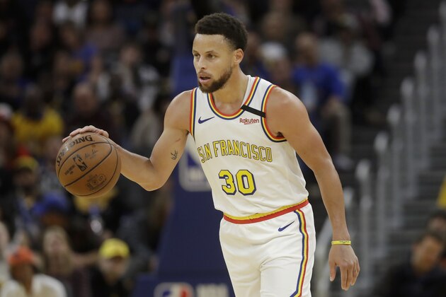 Golden State Warriors guard Stephen Curry (30) dribbles the ball up the court against the Toronto Raptors during the second half of an NBA basketball game in San Francisco, Thursday, March 5, 2020. (AP Photo/Jeff Chiu) Golden State Warriors guard Stephen Curry (30) dribbles the ball up the court against the Toronto Raptors during the second half of an NBA basketball game in San Francisco, Thursday, March 5, 2020. (AP Photo/Jeff Chiu)