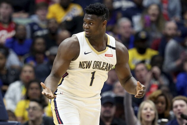 New Orleans Pelicans forward Zion Williamson (1) reacts after a basket in the first half of an NBA basketball game in New Orleans, Sunday, March 1, 2020. (AP Photo/Rusty Costanza)