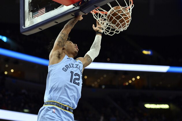 Memphis Grizzlies guard Ja Morant dunks during the first half of the team's NBA basketball game against the Orlando Magic Tuesday, March 10, 2020, in Memphis, Tenn. (AP Photo/Brandon Dill)