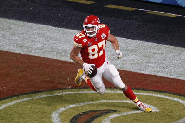 Kansas City Chiefs tight end Travis Kelce (87) scores a touchdown against the San Francisco 49ers during the NFL Super Bowl 54 football game Sunday, Feb. 2, 2020, in Miami Gardens, Fla. (AP Photo/Adam Hunger)