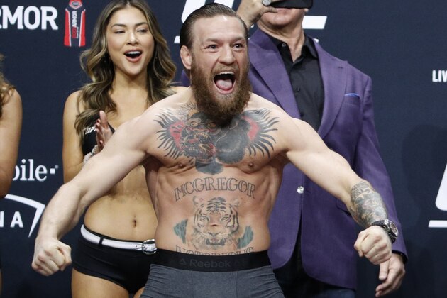 Conor McGregor poses during a ceremonial weigh-in for the UFC 246 mixed martial arts bout, Friday, Jan. 17, 2020, in Las Vegas. McGregor is scheduled to fight Donald
