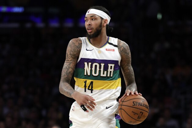 New Orleans Pelicans' Brandon Ingram (14) dribbles during the second half of an NBA basketball game against the Los Angeles Lakers Tuesday, Feb. 25, 2020, in Los Angeles. (AP Photo/Marcio Jose Sanchez)