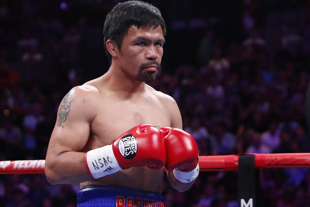 Manny Pacquiao prepares to fight Keith Thurman in a welterweight title fight Saturday, July 20, 2019, in Las Vegas. (AP Photo/John Locher)