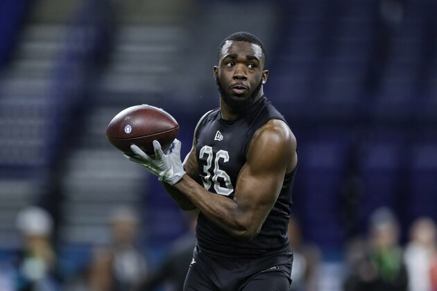 Baylor wide receiver Denzel Mims runs a drill at the NFL football scouting combine in Indianapolis, Thursday, Feb. 27, 2020. (AP Photo/Michael Conroy)