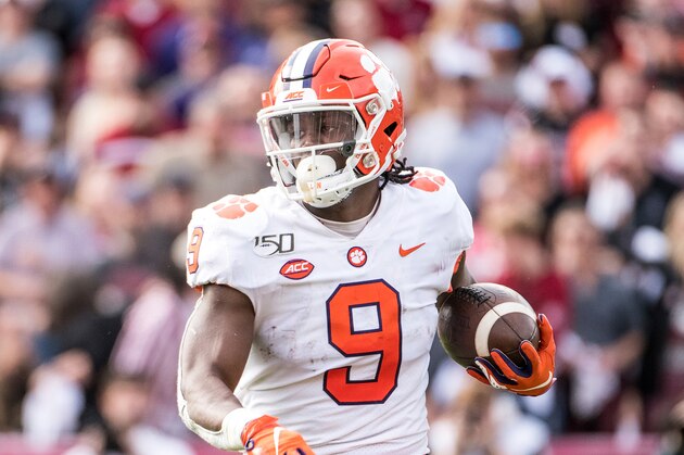 Clemson running back Travis Etienne (9) carries the ball against South Carolina during an NCAA college football game Saturday, Nov. 30, 2019, in Columbia, S.C. Clemson defeated South Carolina 38-3. (AP Photo/Sean Rayford)