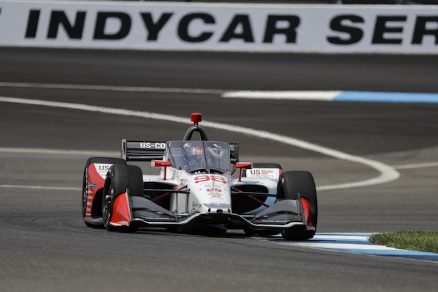 Race driver Marco Andretti drives through a turn during practice for the IndyCar auto race at Indianapolis Motor Speedway in Indianapolis, Friday, July 3, 2020. (AP Photo/Darron Cummings)