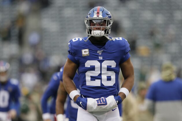 New York Giants running back Saquon Barkley warms-up before an NFL football game against the Green Bay Packers, Sunday, Dec. 1, 2019, in East Rutherford, N.J. (AP Photo/Adam Hunger)