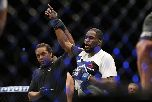Corey Anderson celebrates after defeating Jan Blachowicz during their light heavyweight mixed martial arts bout at UFC 191 on Saturday, Sept. 5, 2015, in Las Vegas. (AP Photo/John Locher)