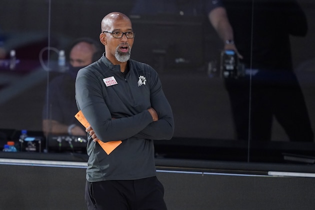 Phoenix Suns head coach Monty Williams watches play during the second half of an NBA basketball game against the Philadelphia 76ers Tuesday, Aug. 11, 2020, in Lake Buena Vista, Fla. (AP Photo/Ashley Landis, Pool)