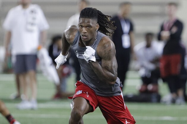 Oklahoma wide receiver CeeDee Lamb runs through drills during Pro Day for NFL football scouts and coaches in Norman, Okla., Wednesday, March 11, 2020. (AP Photo/Alonzo Adams)