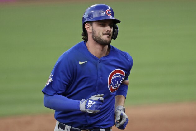 Chicago Cubs' Kris Bryant runs the bases after hitting a solo home run in the sixth inning in a baseball game against the Cleveland Indians, Wednesday, Aug. 12, 2020, in Cleveland. (AP Photo/Tony Dejak) Chicago Cubs' Kris Bryant runs the bases after hitting a solo home run in the sixth inning in a baseball game against the Cleveland Indians, Wednesday, Aug. 12, 2020, in Cleveland. (AP Photo/Tony Dejak)