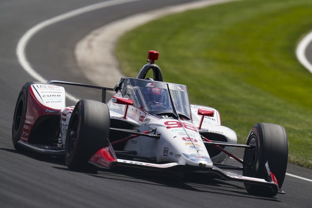 Marco Andretti drives through the third turn during qualifying for the Indianapolis 500 auto race at Indianapolis Motor Speedway in Indianapolis, Saturday, Aug. 15, 2020. (AP Photo/Michael Conroy)