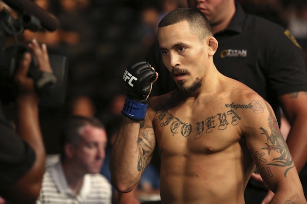 Marlon Vera walks back to the locker room after a win against Brian Kelleher after their mixed martial arts bout at UFC on Fox 25, Saturday, July 22, 2017, in New York. Vera won via submission. (AP Photo/Steve Luciano)