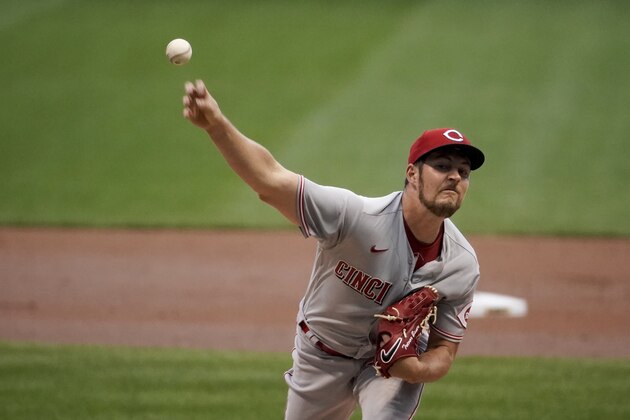 Cincinnati Reds starting pitcher Trevor Bauer throws during the first inning of a baseball game against the Milwaukee Brewers Friday, Aug. 7, 2020, in Milwaukee. (AP Photo/Morry Gash)