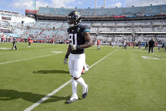 Jacksonville Jaguars defensive end Yannick Ngakoue (91) warms up before an NFL football game against the Tampa Bay Buccaneers Sunday, Dec. 1, 2019, in Jacksonville, Fla. (AP Photo/Phelan M. Ebenhack)