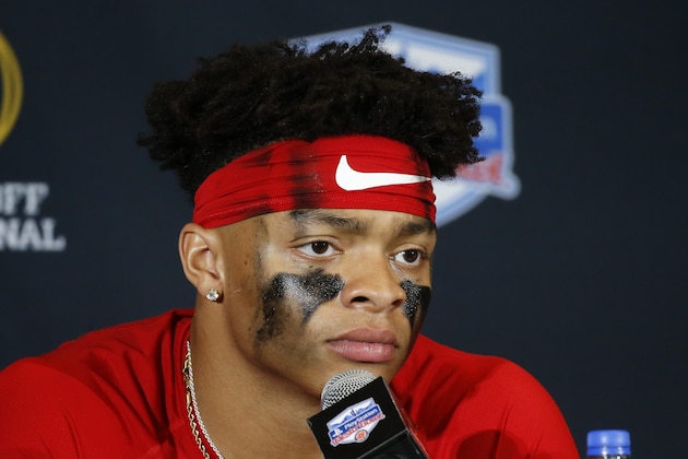 Ohio State quarterback Justin Fields speaks during a news conference after the team's 29-23 loss to Clemson in the Fiesta Bowl NCAA college football playoff semifinal Saturday, Dec. 28, 2019, in Glendale, Ariz. (AP Photo/Ross D. Franklin)