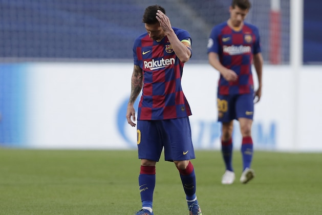 Barcelona's Lionel Messi reacts during the Champions League quarterfinal match between FC Barcelona and Bayern Munich at the Luz stadium in Lisbon, Portugal, Friday, Aug. 14, 2020. (AP Photo/Manu Fernandez/Pool)