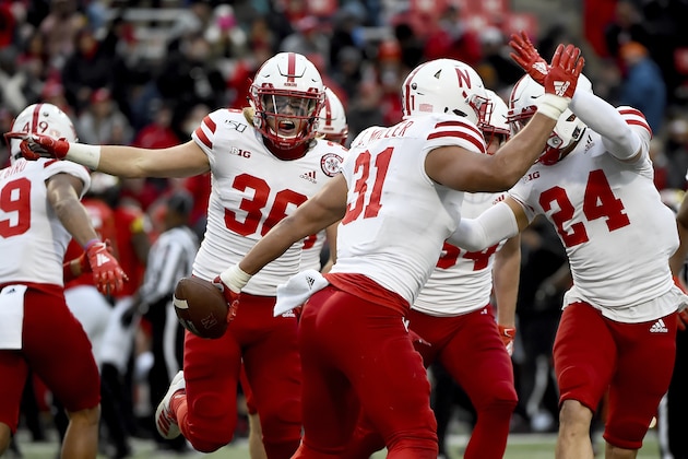Nebraska linebacker Collin Miller (31) celebrates with teammates after recovering a fumble from Maryland running back Javon Leake (20) during a kick return in the first half of an NCAA college football game, Saturday, Nov. 23, 2019, in College Park, Md. (AP Photo/Will Newton)