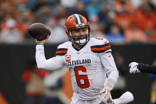 Cleveland Browns quarterback Baker Mayfield looks to throw during the first half of an NFL football game against the Cincinnati Bengals, Sunday, Dec. 29, 2019, in Cincinnati. (AP Photo/Gary Landers)