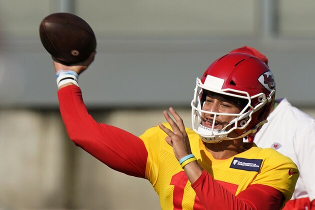 Kansas City Chiefs quarterback Patrick Mahomes throws the ball during an NFL football training camp Saturday, Aug. 15, 2020, in Kansas City, Mo. (AP Photo/Charlie Riedel)