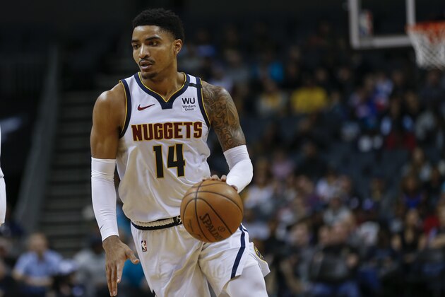 Denver Nuggets guard Gary Harris brings the ball up court against the Charlotte Hornets during the second half of an NBA basketball game in Charlotte, N.C., Thursday, March 5, 2020. Denver won 114-112. (AP Photo/Nell Redmond)