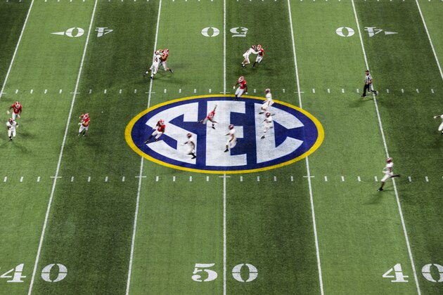 SEC Championship logo on the field during the Southeastern Conference Championship NCAA college football game against the Alabama Crimson Tide and the Georgia Bulldogs on Saturday, Dec. 1, 2018 in Atlanta. (Ric Tapia via AP)