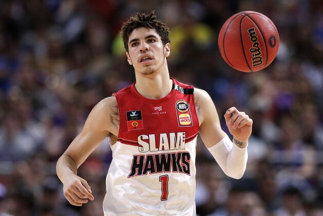 LaMelo Ball of the Illawarra Hawks brings the ball up during their game against the Sydney Kings in the Australian Basketball League in Sydney, Sunday, Nov. 17, 2019. (AP Photo/Rick Rycroft)