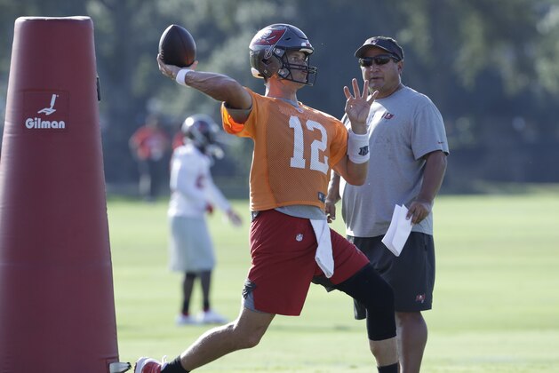 Tampa Bay Buccaneers quarterback Tom Brady (12) during an NFL football organized team activity Thursday, Aug. 13, 2020, in Tampa, Fla. (AP Photo/Chris O'Meara)