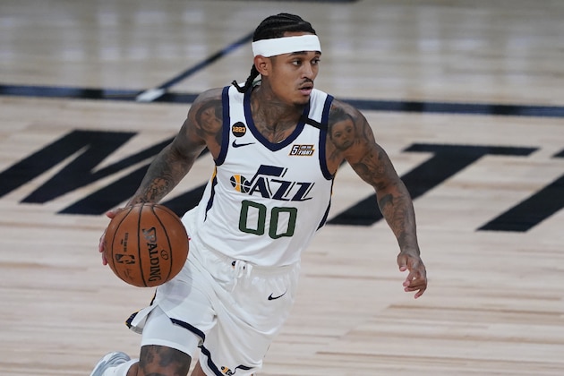 Utah Jazz's Jordan Clarkson (00) drives up the court against the Oklahoma City Thunder during the second half of an NBA basketball game Saturday, Aug. 1, 2020, in Lake Buena Vista, Fla. (AP Photo/Ashley Landis, Pool)