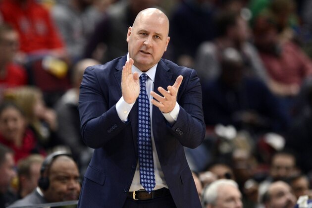 FILE - In this March 10, 2020, file photo, Chicago Bulls coach Jim Boylen cheers on players during the first half of the team's NBA basketball game against the Cleveland Cavaliers in Chicago. Boylen's future is the biggest issue hanging over the Bulls, who were left out when the NBAâ€™s Board of Governors approved a 22-team format to restart the pandemic-interrupted season next month in Orlando. (AP Photo/Paul Beaty, File)