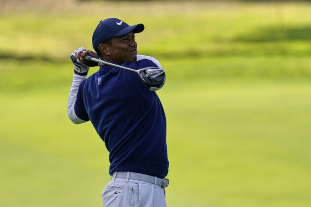 Tiger Woods watches his tee shot on the ninth hole during the third round of the PGA Championship golf tournament at TPC Harding Park Saturday, Aug. 8, 2020, in San Francisco. (AP Photo/Jeff Chiu)