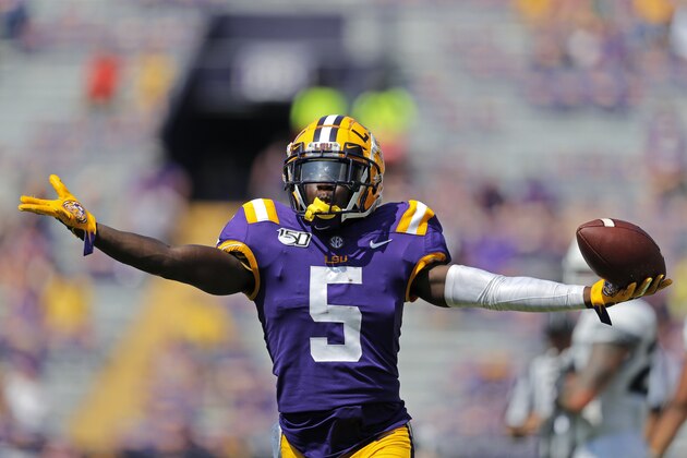 LSU cornerback Kary Vincent Jr. (5) celebrates his interception in the second half of an NCAA college football game against Utah State in Baton Rouge, La., Saturday, Oct. 5, 2019. LSU won 42-6. (AP Photo/Gerald Herbert)