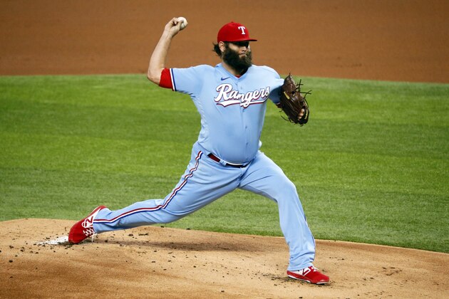 Texas Rangers starting pitcher Lance Lynn delivers to the Los Angeles Angels in the first inning of a baseball game in Arlington, Texas, Sunday, Aug. 9, 2020. (AP Photo/Ray Carlin)