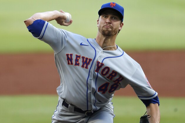 New York Mets starting pitcher Jacob deGrom (48) works the first inning of a baseball game against the Atlanta Braves Monday, Aug. 3, 2020, in Atlanta. (AP Photo/John Bazemore)