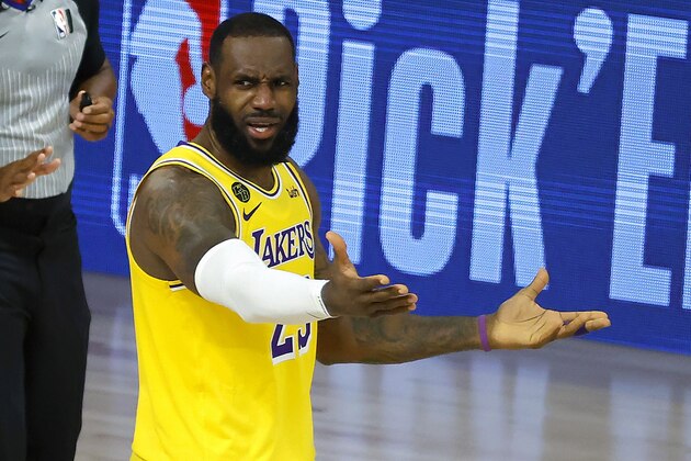LeBron James of the Los Angeles Lakers reacts to a call against the Oklahoma City Thunder during the second half of an NBA basketball game Wednesday, Aug. 5, 2020, in Lake Buena Vista, Fla. (Kevin C. Cox/Pool Photo via AP)