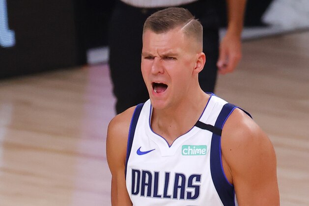 Dallas Mavericks' Kristaps Porzingis reacts to a call and receives a technical foul during the second quarter of Game 1 of an NBA basketball first-round playoff series against the Los Angeles Clippers, Monday, Aug. 17, 2020, in Lake Buena Vista, Fla. (Kevin C. Cox/Pool Photo via AP)