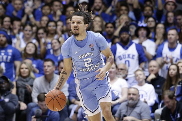 North Carolina guard Cole Anthony (2) dribbles against Duke during the first half of an NCAA college basketball game in Durham, N.C., Saturday, March 7, 2020. (AP Photo/Gerry Broome)