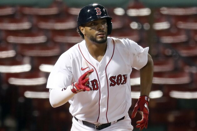 Boston Red Sox's Xander Bogaerts plays against the Tampa Bay Rays during the ninth inning of a baseball game, Monday, Aug. 10, 2020, in Boston. (AP Photo/Michael Dwyer)